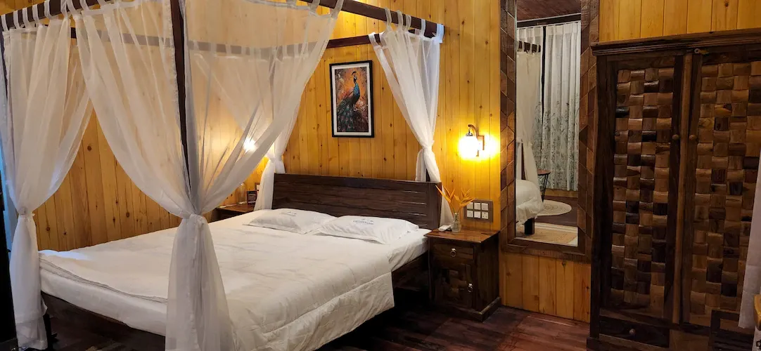 The Machan bedroom, with mirror and woven wardrobe